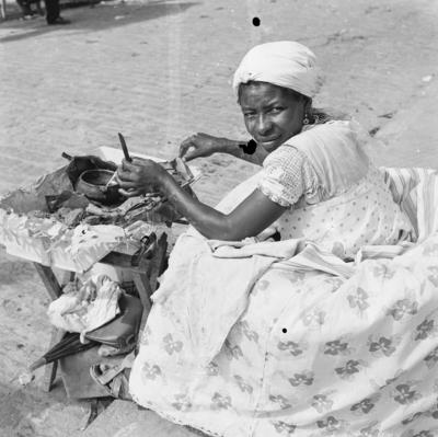 Vendedora de acarajé na procissão de Nosso Senhor dos Navegantes