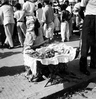 Vendedora de acarajé na Procissão de Nosso Senhor dos Navegantes