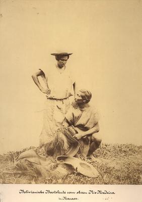 Barqueiros bolivianos às margens do rio Madeira