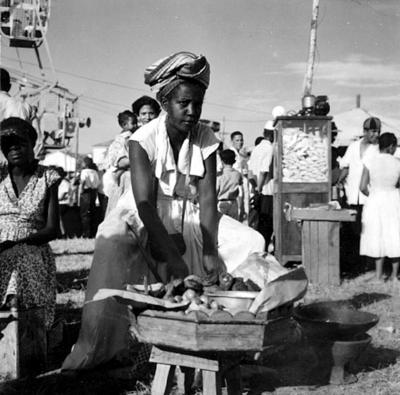 Vendedora de acarajé na procissão de Nosso Senhor dos Navegantes