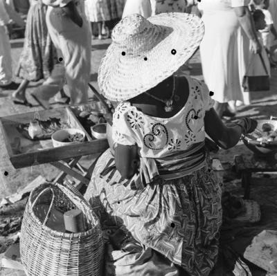 Vendedora de acarajé na procissão de Nosso Senhor dos Navegantes