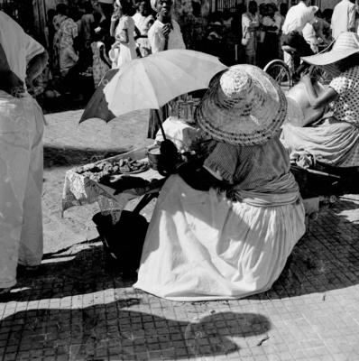 Vendedora de acarajé na procissão de Nosso Senhor dos Navegantes