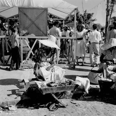 Vendedora de acarajé na procissão de Nosso Senhor dos Navegantes