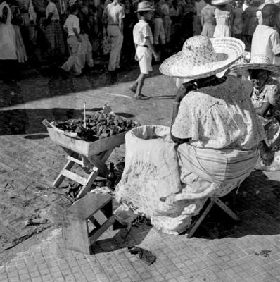 Vendedora de acarajé na procissão de Nosso Senhor dos Navegantes