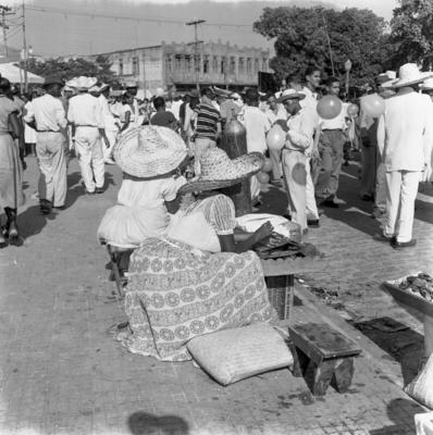 Vendedora de acarajé na procissão de Nosso Senhor dos Navegantes