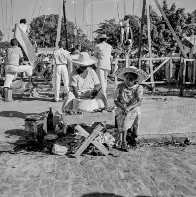 Vendedora de acarajé na procissão de Nosso Senhor dos Navegantes